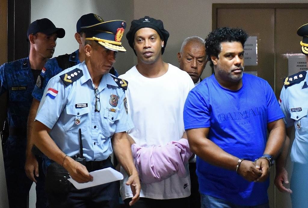 Roberto Assis (right) – fraudulent travel document