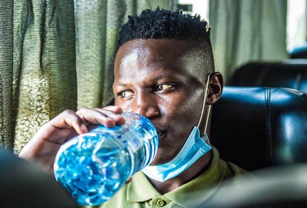 Anthony Akumu Agay inside their bus en route Limbe
