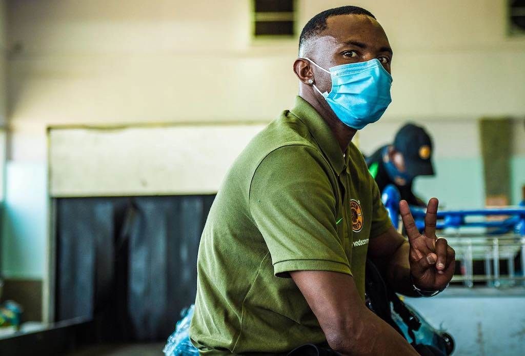 Bernard Parker waiting for his luggage at the Doua
