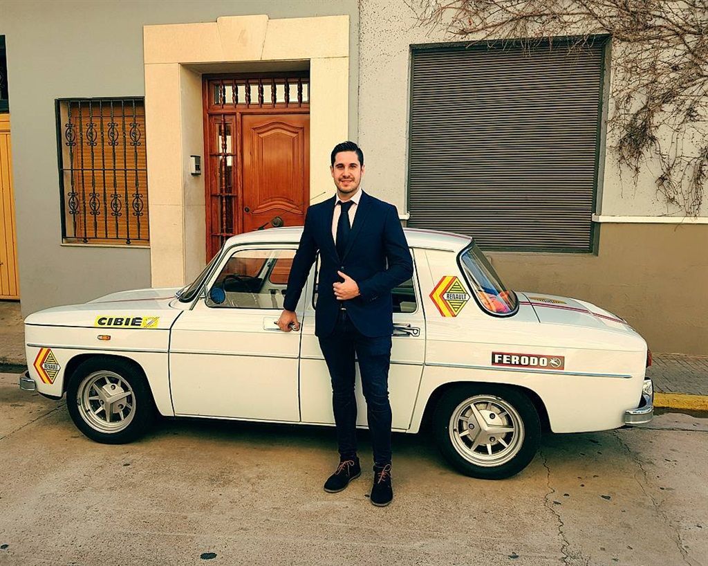 Aitor van den Brule next to a classic Renault 8 Go